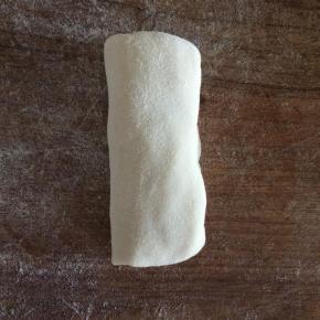 卷起另一边，封口朝下放置