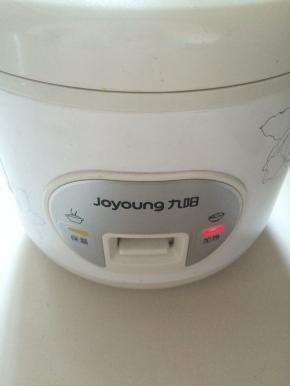 按下煮饭键预热