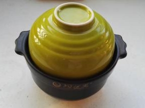 至糯米熬开花，关火焖会。