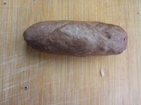 从上往下卷住，收紧口；