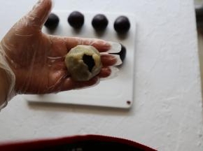 收口向顶部推至完全收住。