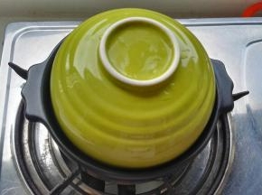 大火烧至水快开转最小火。