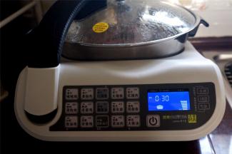 启动自动锅的手动功能，火力调至高火，时间30分钟。
