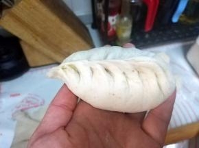 捏紧收口；