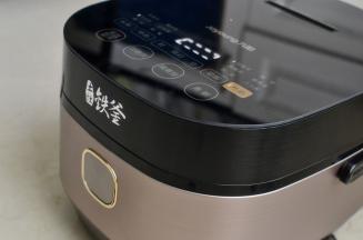 电饭煲选择快速煮饭功能到结束即可