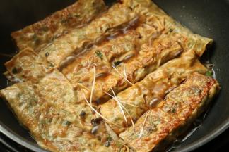 最后大火收一下汁，加葱末即可。