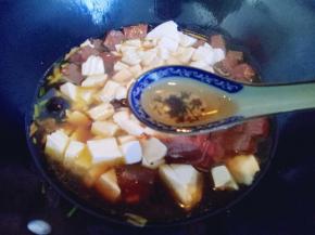 再加入一勺料酒去鸭血的醒味。