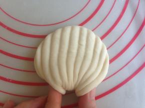 捏住两端，向内捏合