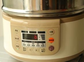 时间到，会自动转入保温，可以再焖5分钟。