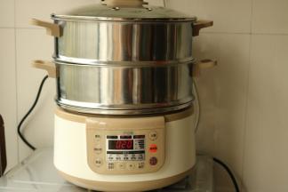 时间到自动转入保温，再焖3分钟。就可以打开了。