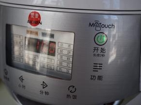 选择煮粥键，默认时间1个小时