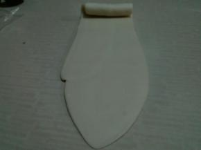 再次擀成长条，自上而下卷起