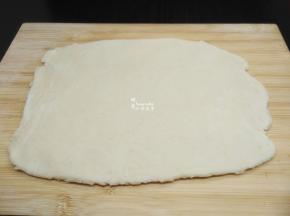 再次擀薄，重复步骤5、6，来回3次；