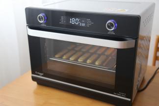 长帝空气烤烤箱转空气烤功能180度预热10分钟后即可放泡芙胚入烤箱中层烤33分钟即可出炉