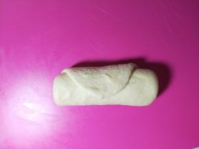 从上往下卷起来。