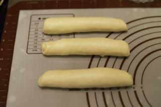 7.	从上往下卷好