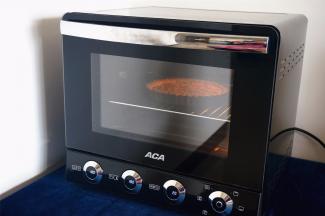 烤箱180度再次预热，预热好后，将橘子酥塔放入中层，180度上下火烘烤15~20分钟。