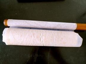 借助擀面杖卷起