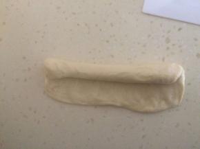 由上向下卷起。