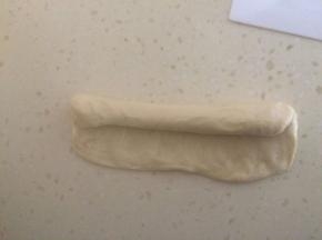 由上向下卷起。