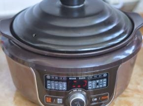 盖上锅盖，让煲仔饭程序继续运行。
