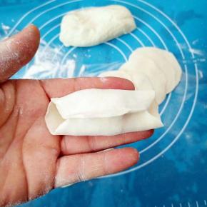 两头对捏就可以了。