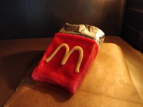 将红口袋放入预热好的烤箱，中层，上下火150度烤10分钟左右。具体时间和温度，要根据不同烤箱实际炉温，和擀的皮薄厚，酌情增减