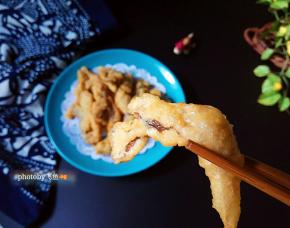 外壳蛋香，蓬松酥脆，内里蘑菇肉劲道有嚼头。