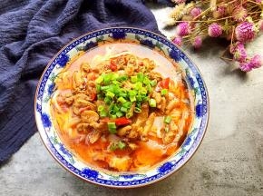舀上鸡杂，撒上葱花就做好啦！