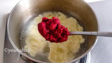 待蛋液浮起时，放入红曲酒酿搅匀