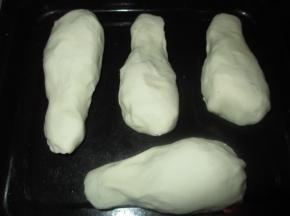 把所有的鸡腿全部包好后放进烤盘