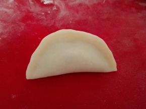 对折，捏紧，