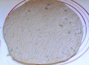 10、然后用叉子扎眼排气，打开烤箱预热