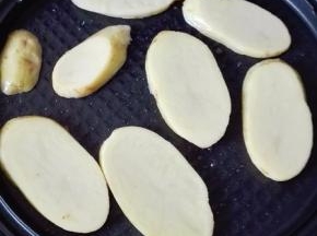 放土豆片，合上上盖，用大饼按键，自动煎