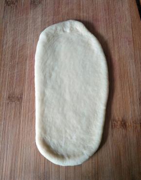 取一个面团擀长