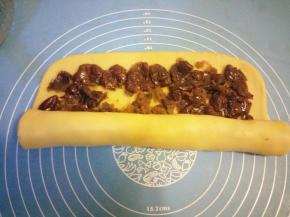 从一头卷起，卷紧