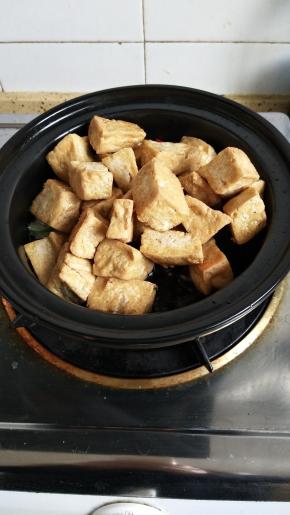 放入豆腐