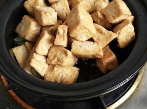 放入豆腐