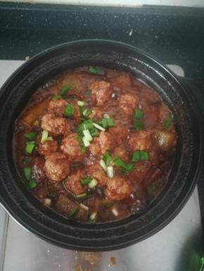 撒上一点葱花。大火收汁。即可。