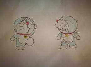 在白纸上画出机器猫的形状。