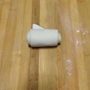 从一头向另一头卷起来