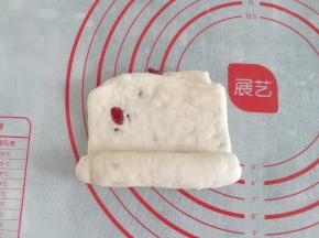 再把它卷起来；