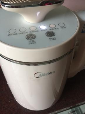 盖上盖子按玉米汁键即可