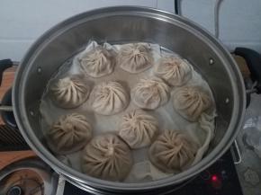 到时间后，不要马上打开盖子，三分钟之后开盖，我们的包子就完成了。