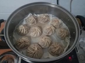 到时间后，不要马上打开盖子，三分钟之后开盖，我们的包子就完成了。