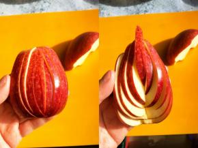 苹果切成花型，左右正反切6刀，不要切段，切好的苹果轻轻一推就变成了美丽的花