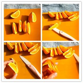 国橙对半切开在切开分成八份，取一个顺着头沿着白边切到尾部三分之一处，不要切段。
在去掉皮的左右前两端长短不一划两刀需要划开。像这样划四道