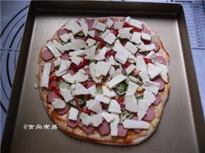 再铺一层芝士碎