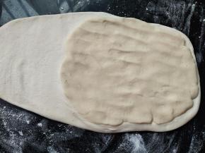 油稣铺在油皮2/3处