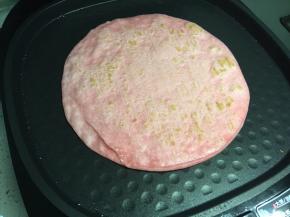 加入鸡肉条，翻炒。